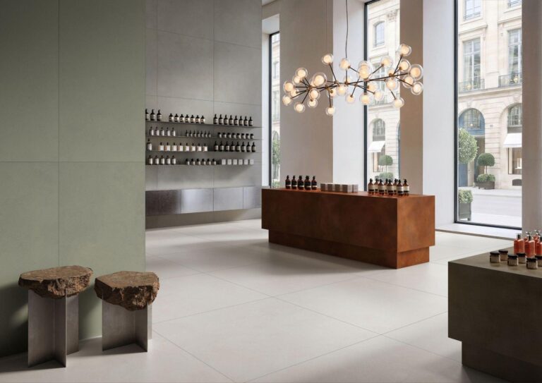 Deciphering the Surface: The Code and a New Grammar of Design from VitrA Tiles at Cersaie VitrA Tiles showroom interior with large-format tiles: Deciphering the Surface: The Code and a New Grammar of Design from VitrA Tiles at Cersaie
