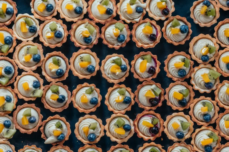 Mini Sugar Cookie Tarts With Vanilla Cream and Winter Fruit mini sugar cookie tarts
